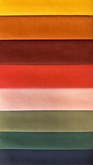 Warm-Colored Textile Swatches in Horizontal Stripes. close-up of warm-toned textile swatches, arranged in horizontal stripes, featuring earthy colors © atikinka2