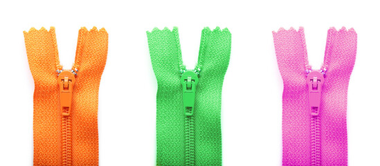 Set of zippers on white background, closeup