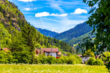 Austria alpine mountain landscape panorama with blue sky and nature.