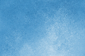 Abstract grungy texture background with different shades of blue color. Painted canvas, concrete surface, studio backdrop, grainy textured effect