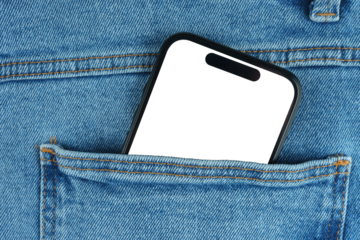 Mockup, template of modern smartphone with blank transparent, white screen with copy space, partially tucked into blue denim jeans pocket. Technology, fashion or lifestyle concepts.
