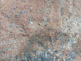 Rusted Grunge Metal Texture Close-Up. Close-up of a weathered, rusted metal surface with natural corrosion patterns and gritty texture, ideal for backgrounds or design overlays