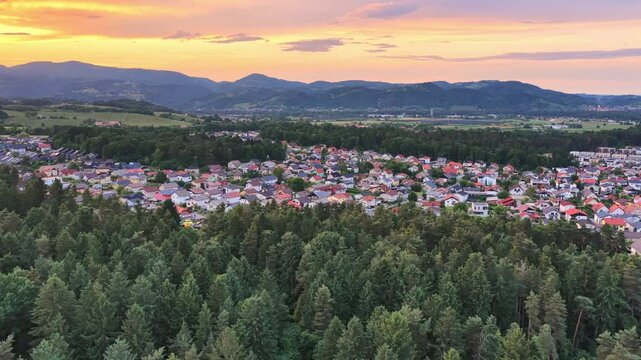 Maribor suburb showing colorful sunset over pohorje mountains