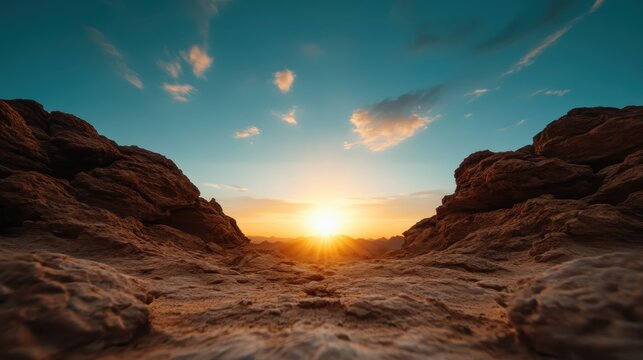 A breathtaking sunset emerges behind rugged rocks, encapsulating the tranquil beauty of nature while portraying feelings of peace, solitude, and wonder.
