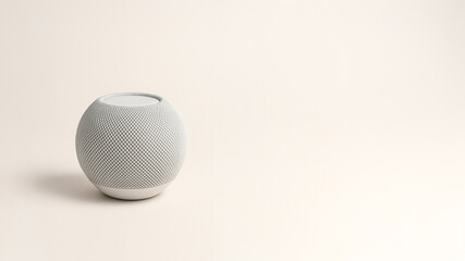 Minimalist modern wireless smart speaker on soft beige background, luxury lifestyle technology concept, ideal for marketing, UI/UX mockup, and product advertising visuals.

