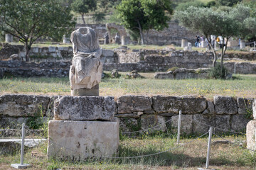 An ancient Greek statue, located on the site of Ancient Agora, in the centre of Athens