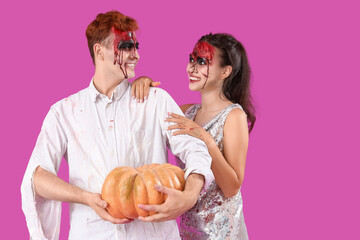 Scary zombies with pumpkin on purple background