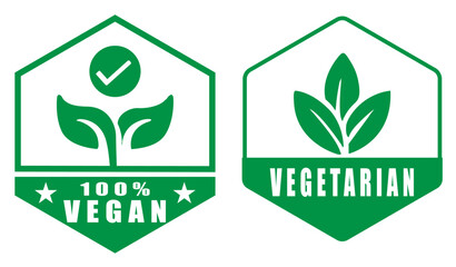 Two green and white vegan and vegetarian labels with leaves on a white background isolated. Vegan and vegetarian food logo badge. Green product label with leaf icons
