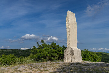 Monument symbolizing the Glagolitic alphabet, view of the panorama of the island of KRK