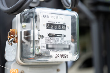 Electric measuring power meter for energy cost at home and office.