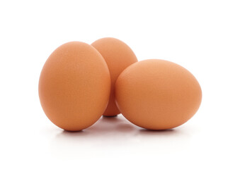 Three chicken eggs.
