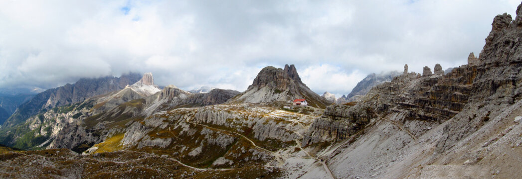 Tre Cime di Lavaredo Dolomites classic landscape view. Famous mountain summits of the Alps. Dolomiti Alps beautiful landscape with blue sky in summer. Hiking and trekking in the Dolomite Alps de Sesto