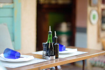 National restaurant tables on the street of the Old Bar Town in Montenegro