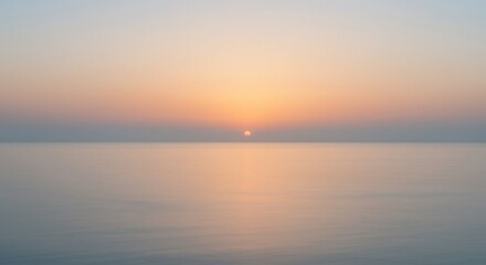 Obraz premium Pastel Sunset Over Calm Ocean