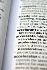 Close Up Of English Dictionary Page With Word - Accelerate