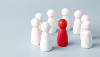 Standing out in a crowd with a unique red figure surrounded by white figures