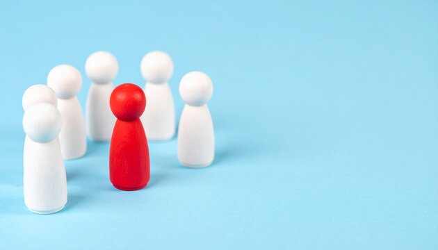 A red figure stands out among a group of white ones, highlighting the concept of standing out or being unique