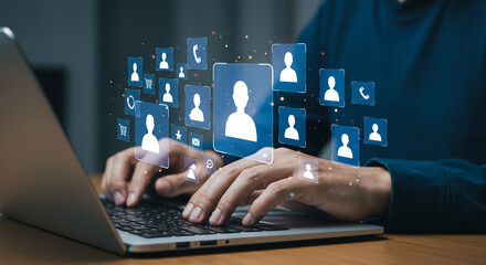 Person using laptop with digital social media icons