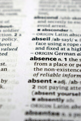 Close Up Of English Dictionary Page With Word - Absence