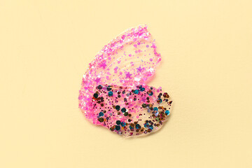 Glitter strokes on beige background