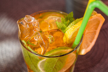 cold and refreshing orange punch cocktail, summer drink