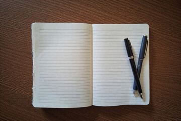 open book with blank pages on the table