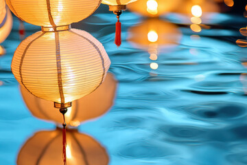 Obraz premium Floating lanterns reflecting in water create serene and magical atmosphere, illuminating night