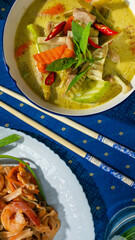 Asian herbal curry symphony embraces exotic Thai zen; delicate chopsticks await Loy Krathong...