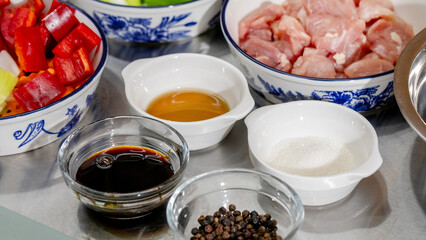 Assorted vibrant ingredients poised for a culinary symphony, inviting Lunar New Year revelry, savory artisanship, gastronomic whimsy