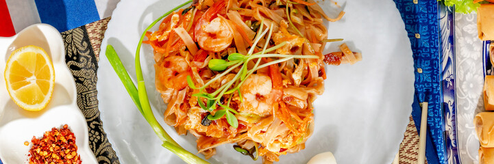 Vibrant shrimp and noodle fusion, zesty Thai street festival flair, som tam whispers, Songkran...