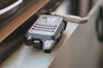 walkie talkie lying near the window