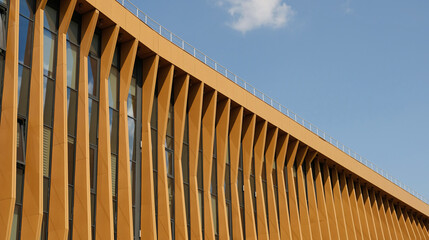 Terracotta fins create striking facade on modern building. Contemporary urban architecture and sustainable building practices. Real estate, residential apartments and office building architecture.