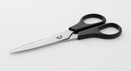 Fototapeta premium Stainless steel scissors with black ergonomic handles placed diagonally on a clean white background, professional studio lighting, high resolution, isolated object