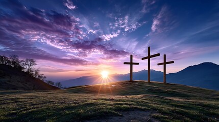 Obraz premium Three Crosses on a Hill at Sunset with a Dramatic Sky Religion