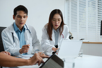 Medical, meeting and laptop for team in office in discussion, brainstorming and planning. Doctor, nurse and computer on desk, teamwork or workshop for data analytics.