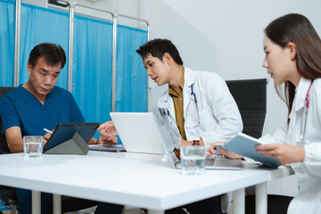 Fototapeta premium Medical, meeting and laptop for team in office in discussion, brainstorming and planning. Doctor, nurse and computer on desk, teamwork or workshop for data analytics.