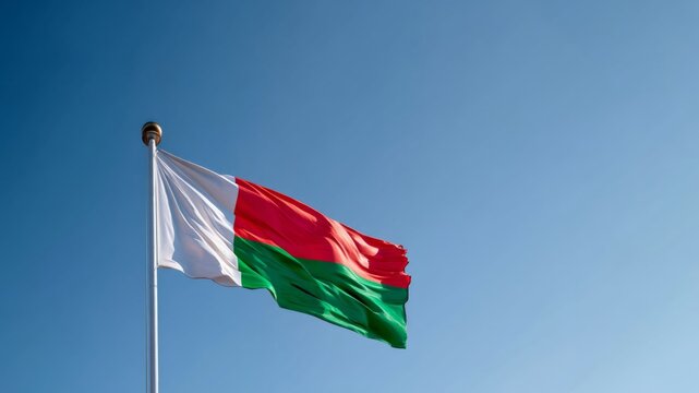 Flag of Madagascar waves proudly in the sky during Independence Day celebration