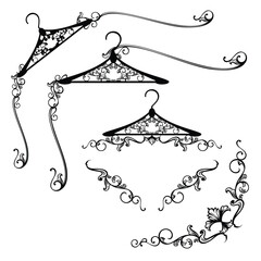 black and white vector design set of elegant calligraphic page decorative elements with luxurious vintage coat hangers for fashion atelier