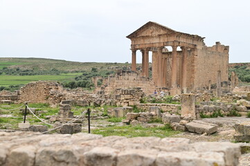 Temple of Saturn with a Panoramic View of the Ancient City of Dougga and Surrounding Hills in Tunisia