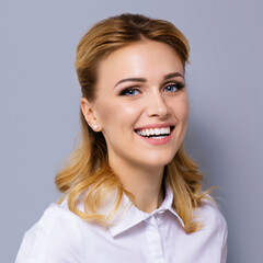 Portrait image - happy smile corporate formal businesswoman, office person. Confident blond hair cute woman wear shirt, isolated grey gray background. Business concept. Square