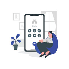 a woman is sitting on a couch and holding a phone