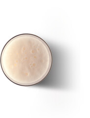 A top view of a frothy beverage in a glass, showcasing its creamy texture and bubbles.