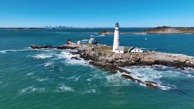 Boston Lighthouse on Little Brewster Island in Boston Harbor, Boston, Massachusetts MA, USA.