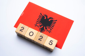 2025, Albania flag with date block, Concept, Important events for Albania the new year, election,...