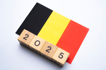 2025, Belgium flag with date block, Concept, Important events for Belgium the new year, election,...