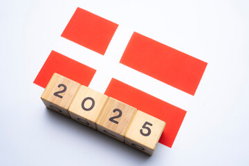 2025, Denmark flag with date block, Concept, Important events for Denmark the new year, election,...