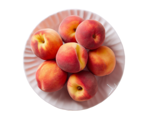peaches in a white bowl, top view isolated on white background