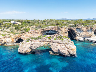 Natural arch Es Pontas near Cala Santanyi on Mallorca island in the Mediterranean sea in Spain