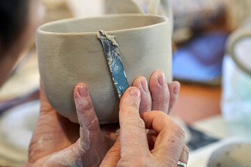 Shape clay with hands