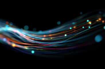 Glowing colorful light streaks surge across a black backdrop accentuated by bokeh orbs